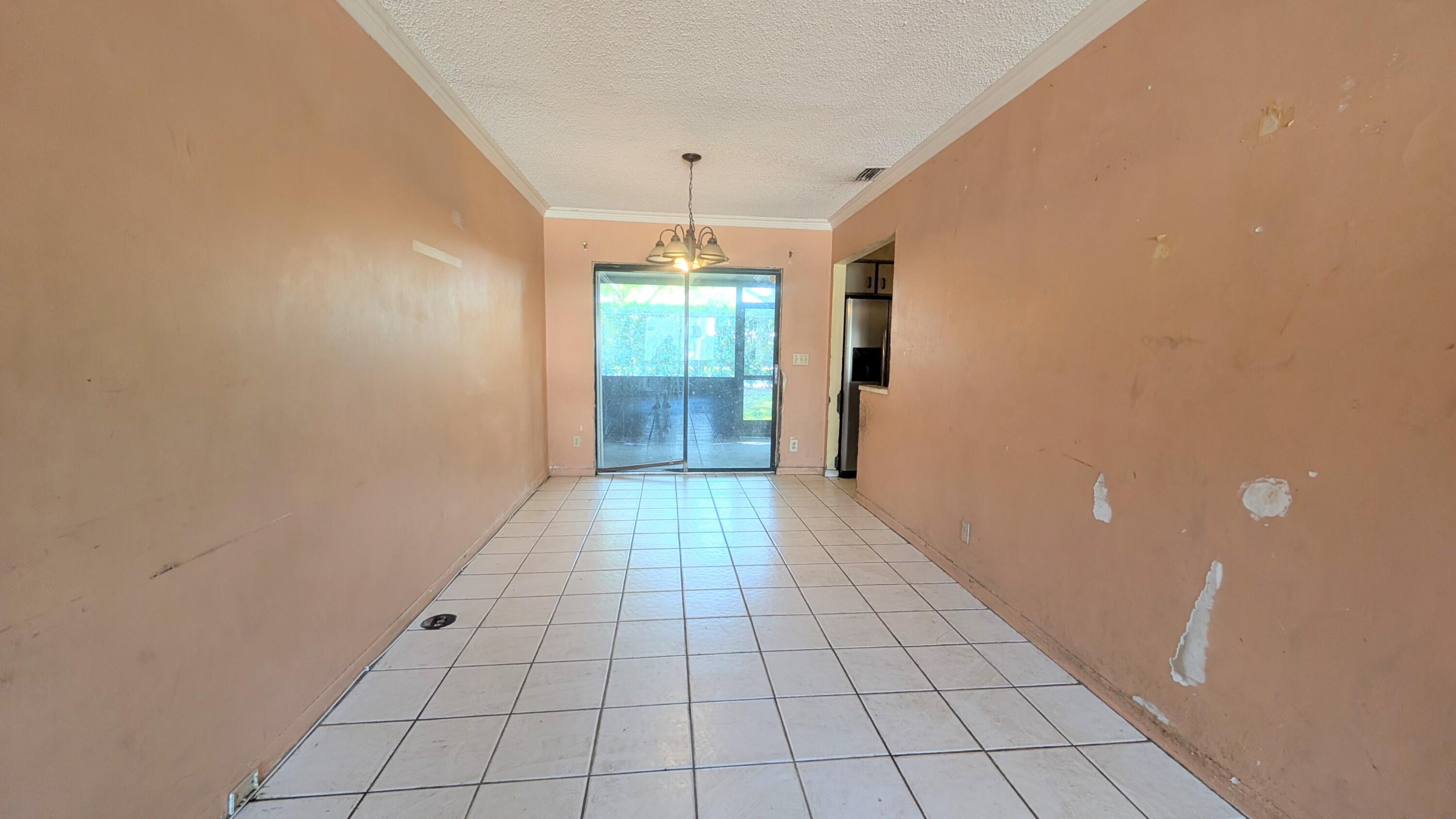 807 Riverside Drive, Unit 7 Greenacres, FL 33463 - Photo 4 of 10 PXL_20260326_203703966.MP~2