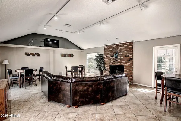 a kitchen with a cabinets and chairs