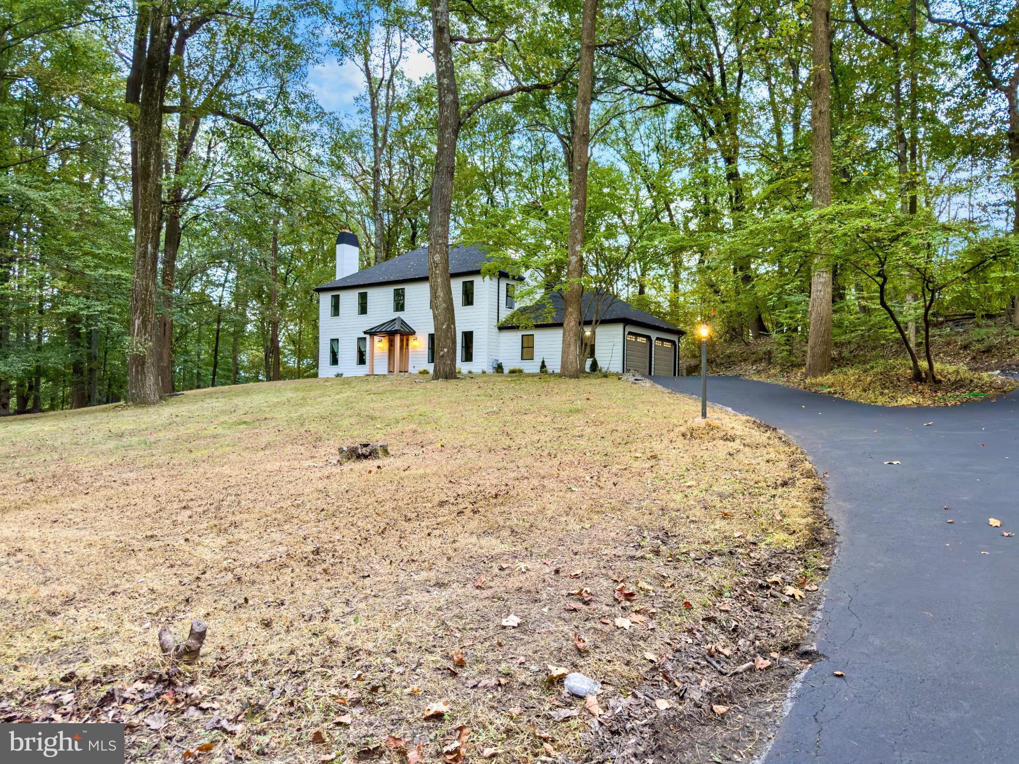 11 Oak Lane Malvern, PA 19355 - Photo 4 of 34 a front view of a house with a yard