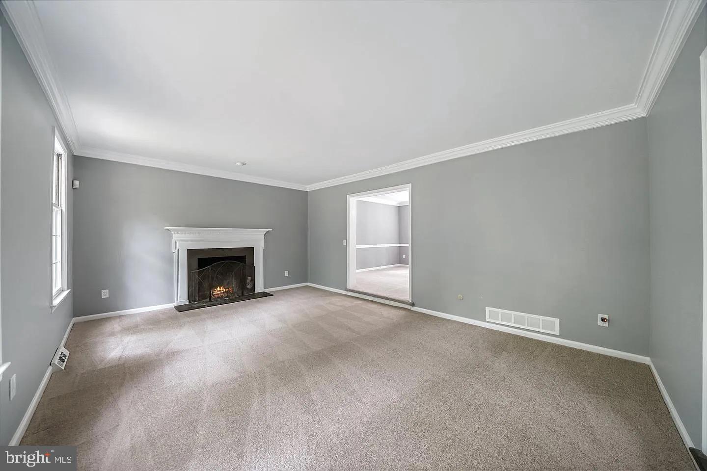 11 Oak Lane Malvern, PA 19355 - Photo 8 of 34 a view of an empty room with a fireplace