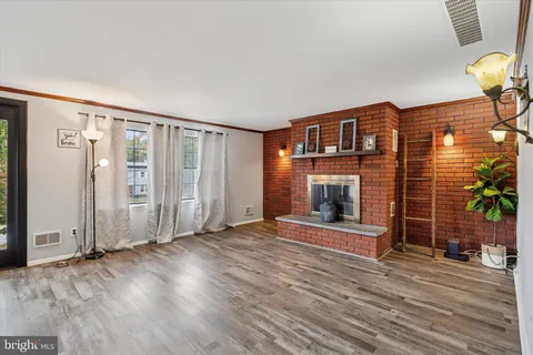 a view of livingroom with furniture and floor to ceiling window