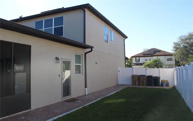a kitchen with a sink cabinets and window