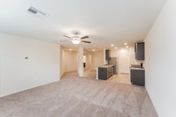 21163 Titan Drive Magnolia, TX 77355 - Photo 11 of 15 a view of a kitchen with a sink and a refrigerator
