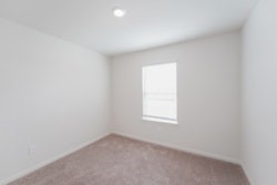 21163 Titan Drive Magnolia, TX 77355 - Photo 6 of 15 an empty room with a window