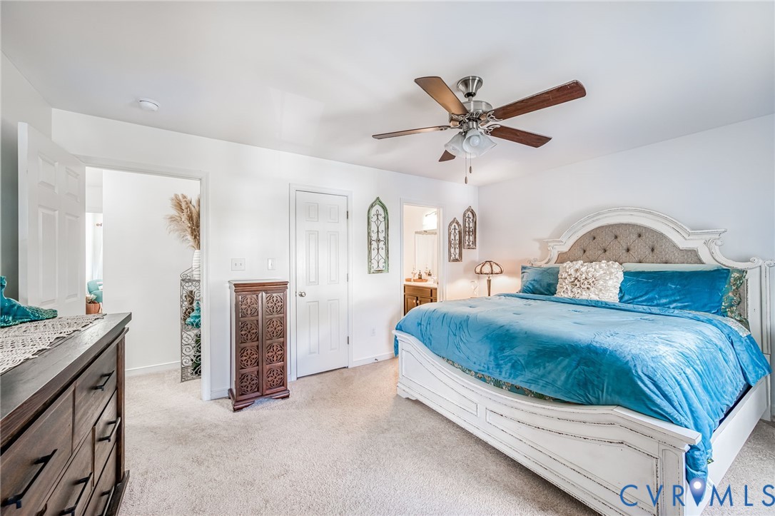 2077 Forest Circle Aylett, VA 23009 - Photo 11 of 36 a living room with furniture and ceiling fan