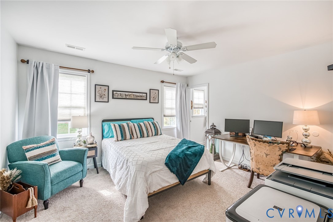 2077 Forest Circle Aylett, VA 23009 - Photo 13 of 36 a bedroom with furniture and a window