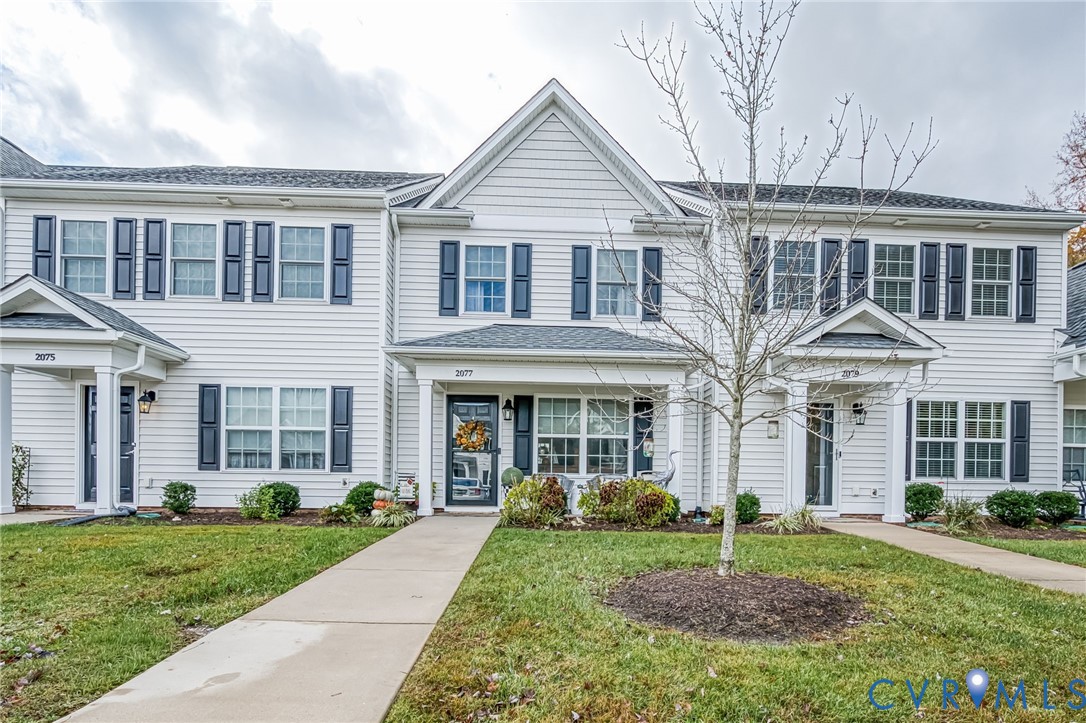 2077 Forest Circle Aylett, VA 23009 - Photo 17 of 36 front view of a house with a yard