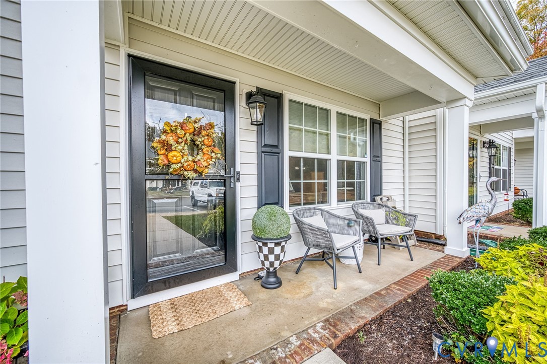 2077 Forest Circle Aylett, VA 23009 - Photo 19 of 36 Beautiful Property entrance featuring covered porc