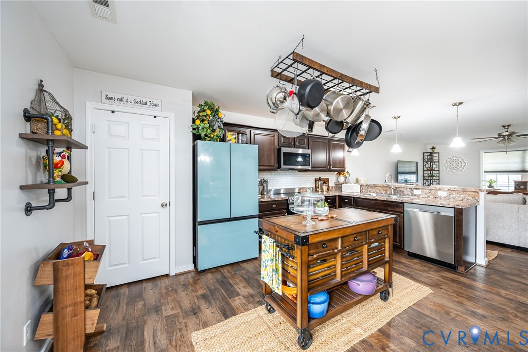 2077 Forest Circle Aylett, VA 23009 - Photo 26 of 36 Kitchen featuring custom appliances, Garbage dispo