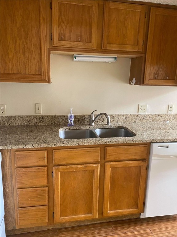 3115 Helms Street, Unit 209 Austin, TX 78705 - Photo 11 of 33 a kitchen with granite countertop cabinets appliances and cabinets