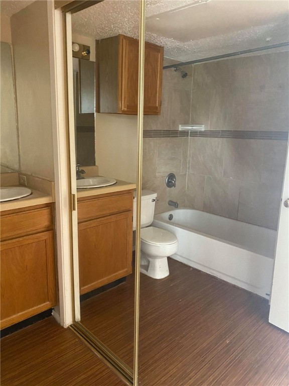 3115 Helms Street, Unit 209 Austin, TX 78705 - Photo 28 of 33 a bathroom with a sink a toilet and shower