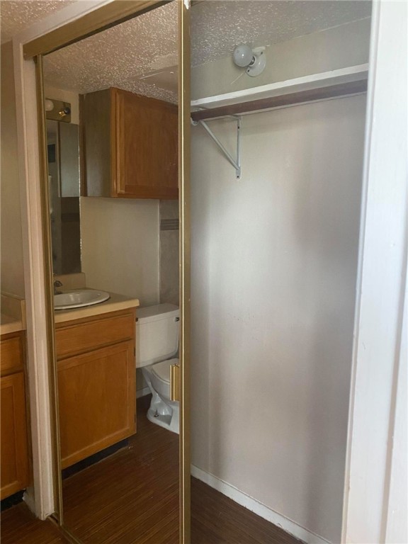 3115 Helms Street, Unit 209 Austin, TX 78705 - Photo 29 of 33 a room with a washer and dryer