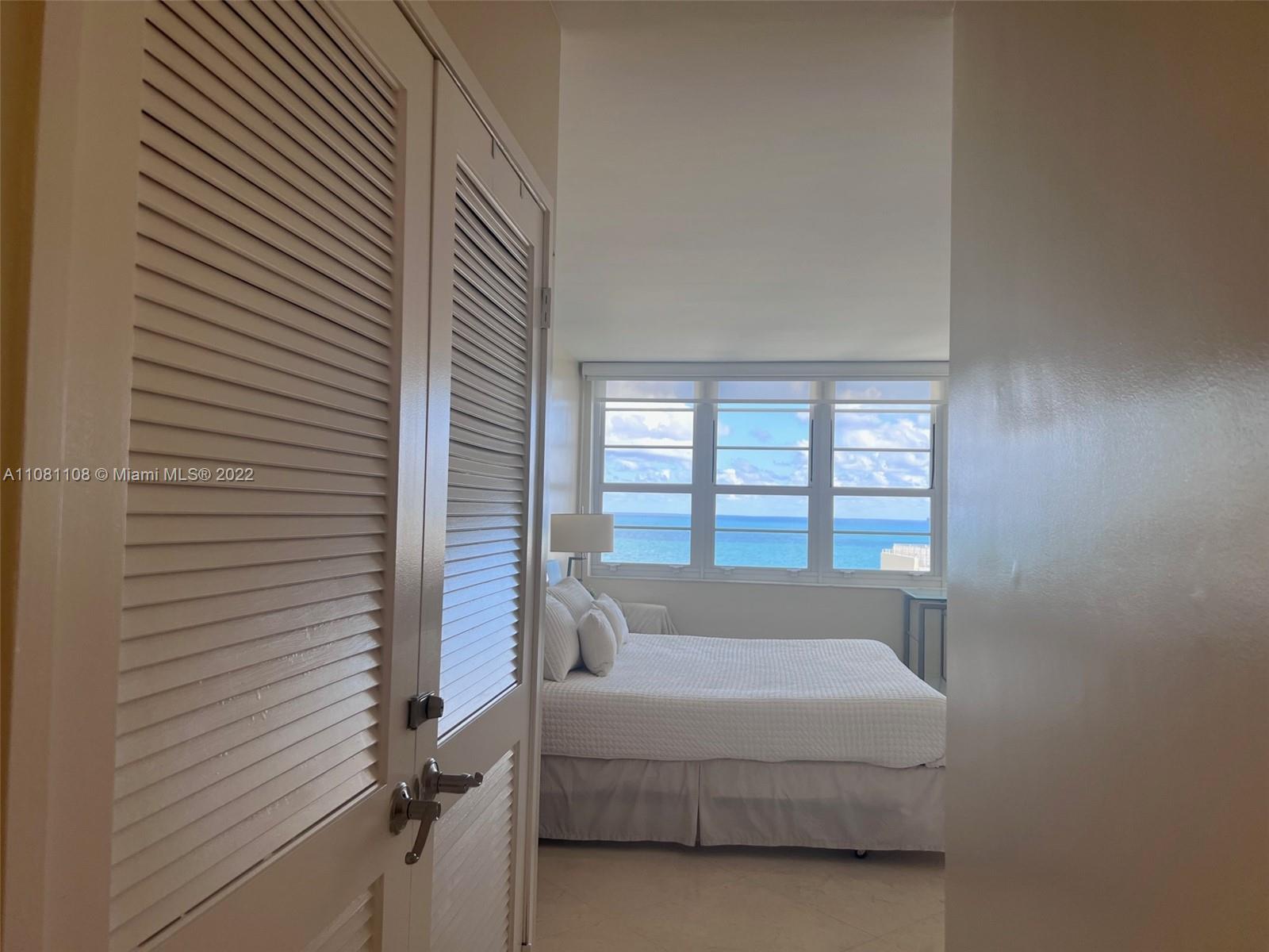 100 Lincoln Road, Unit 1121 Miami Beach, FL 33139 - Photo 14 of 22 a bathroom with a bathtub and next to a window