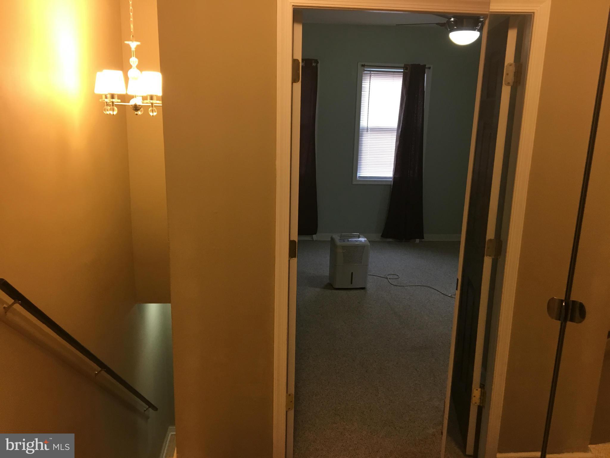 5039 Benning Road Southeast Washington, DC 20019 - Photo 11 of 23 Stairs leading to master bedroom & 3rd bedroom