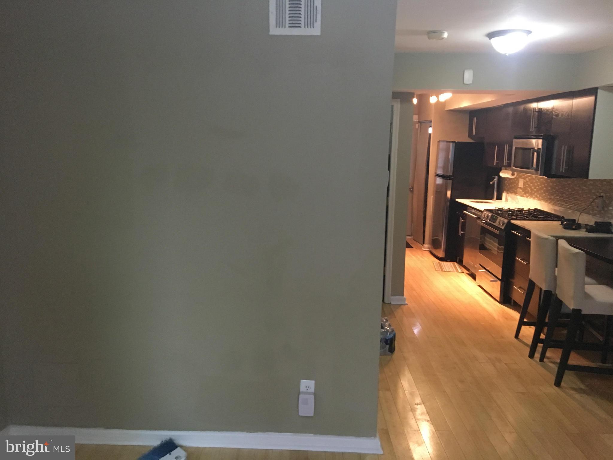 5039 Benning Road Southeast Washington, DC 20019 - Photo 15 of 23 View from living Room into Kitchen