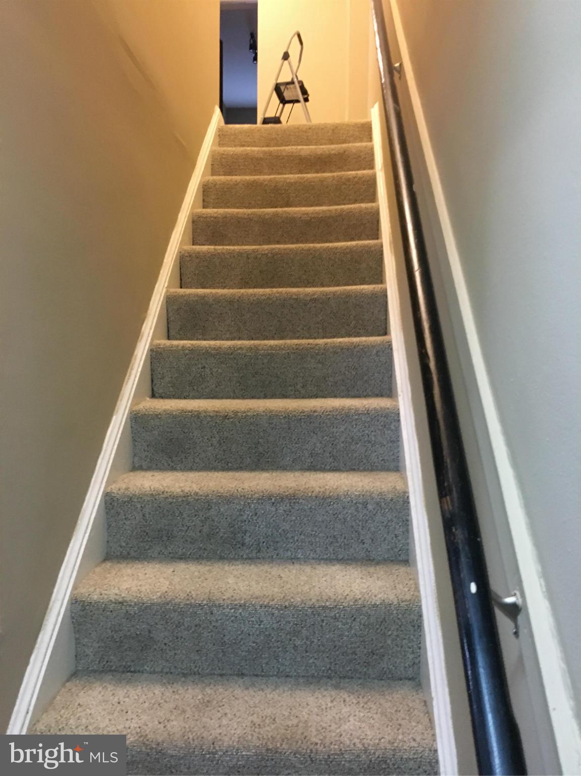5039 Benning Road Southeast Washington, DC 20019 - Photo 6 of 23 Stairs leading to Bedrooms/ Laundry Room