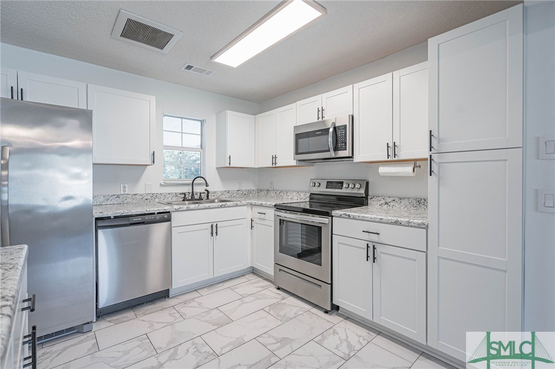 207 Greene Drive Rincon, GA 31326 - Photo 13 of 36 Kitchen