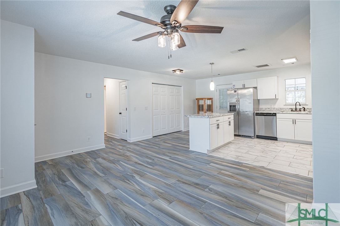 207 Greene Drive Rincon, GA 31326 - Photo 10 of 36 Family room looking into Kitchen