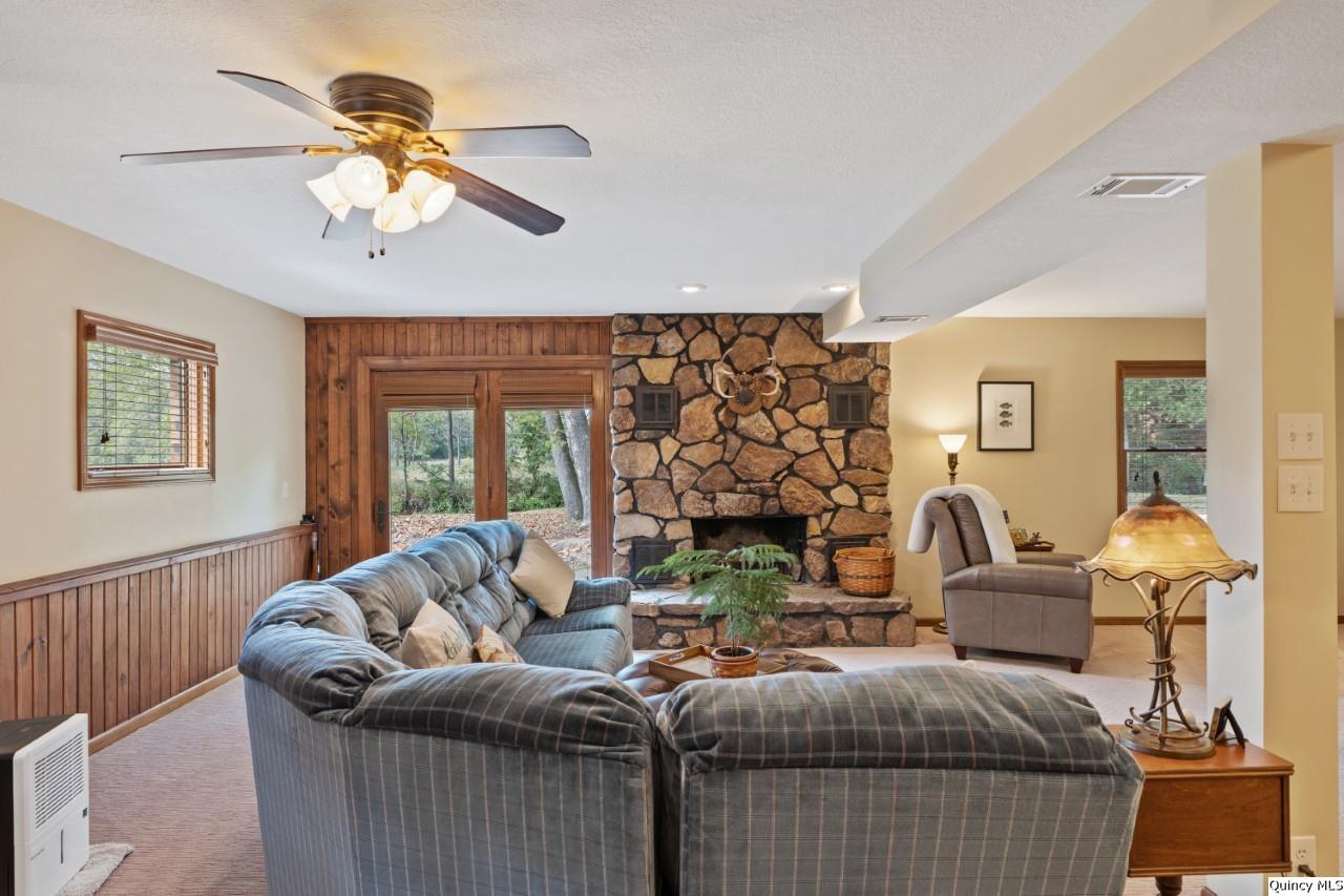 8508 Centerville Road Hannibal, MO 63401 - Photo 6 of 36 a living room with furniture and a large window