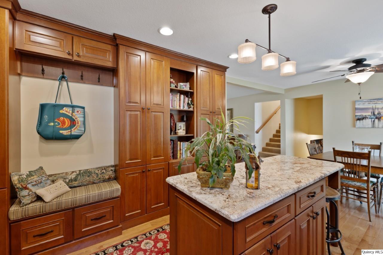 8508 Centerville Road Hannibal, MO 63401 - Photo 10 of 36 a view of kitchen island with granite countertop living room