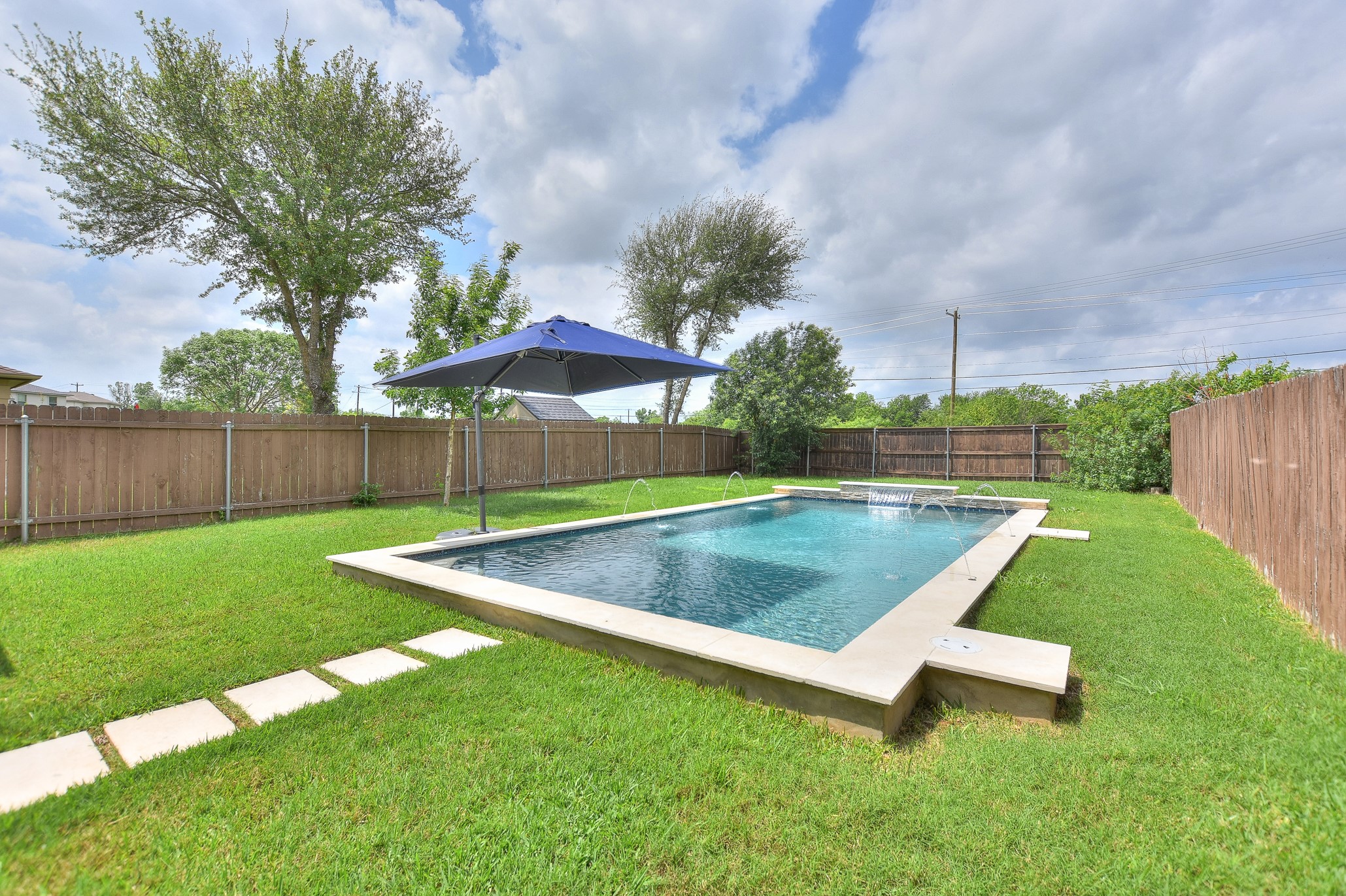 74 Jan Lane Georgetown, TX 78626 - Photo 11 of 31 a view of a backyard with a small cabin