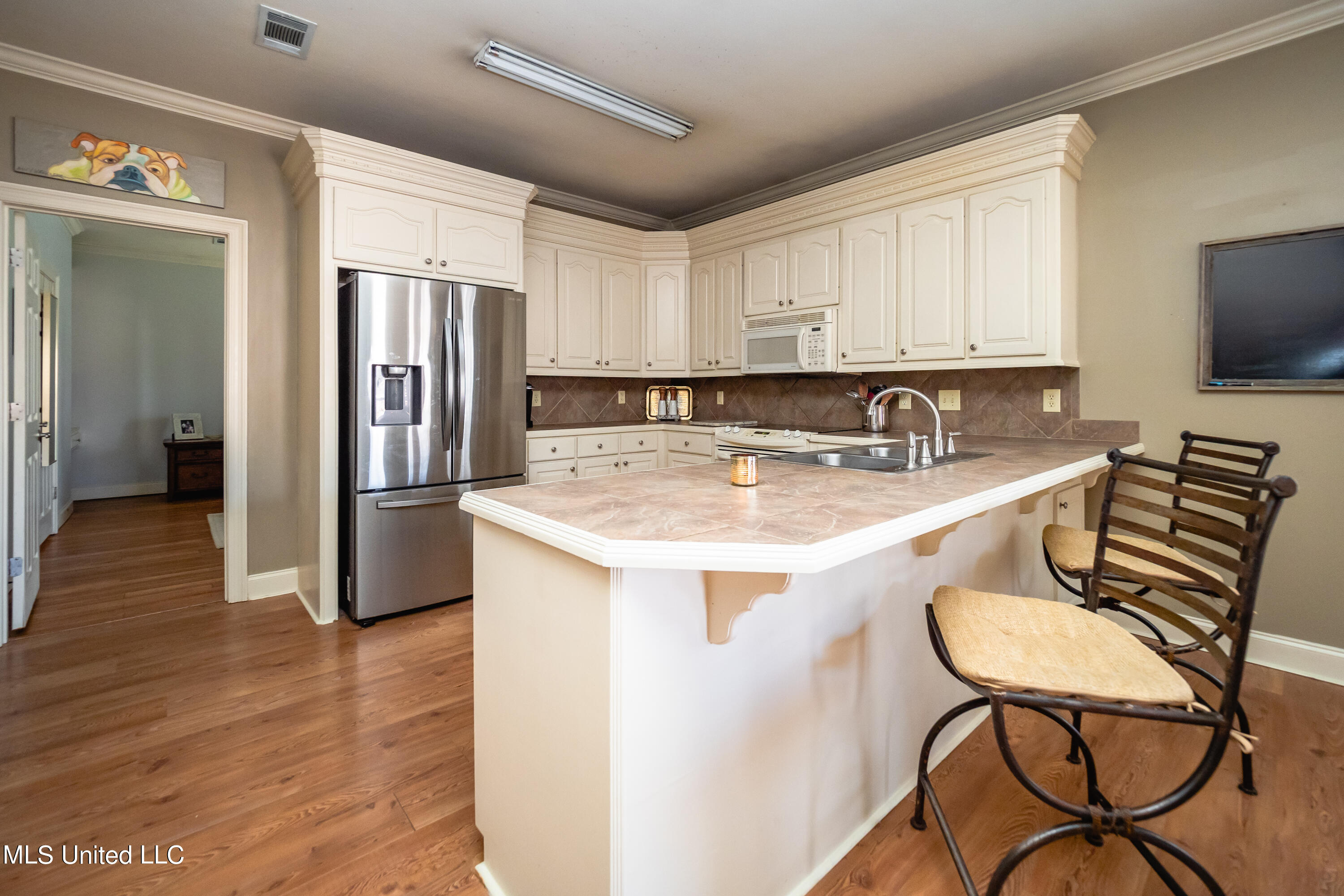 146 Copper Ridge Lane Florence, MS 39073 - Photo 8 of 26 Breakfast Bar Offers Additional Seating