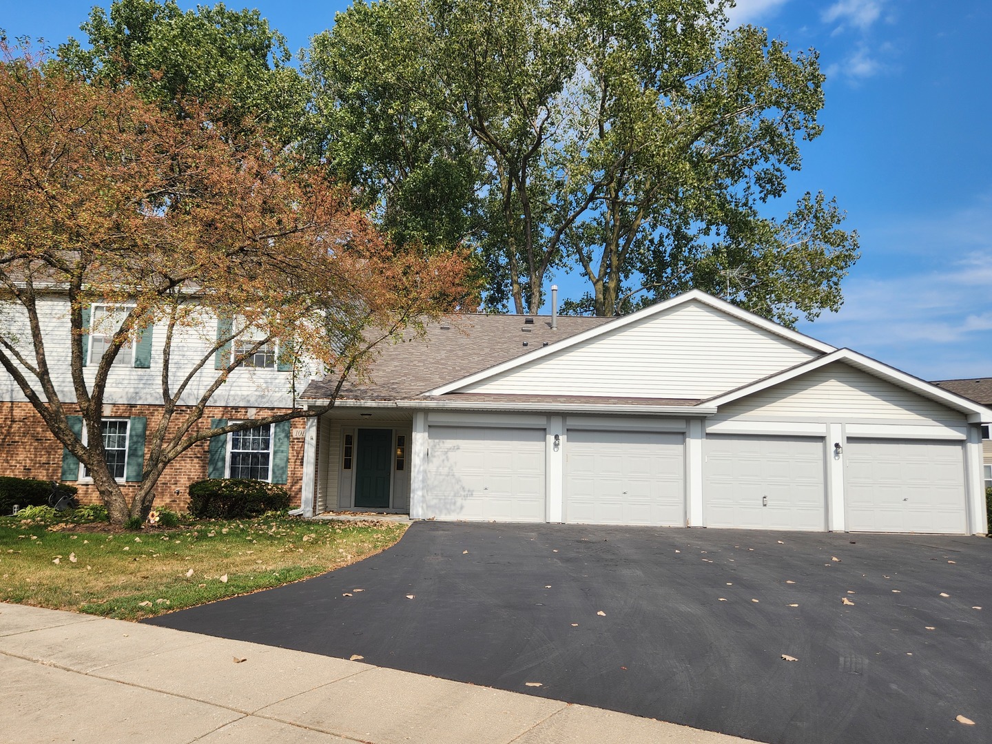 1013 Saxon Court, Unit B Elgin, IL 60120 - Photo 1 of 17 a view of house with a yard
