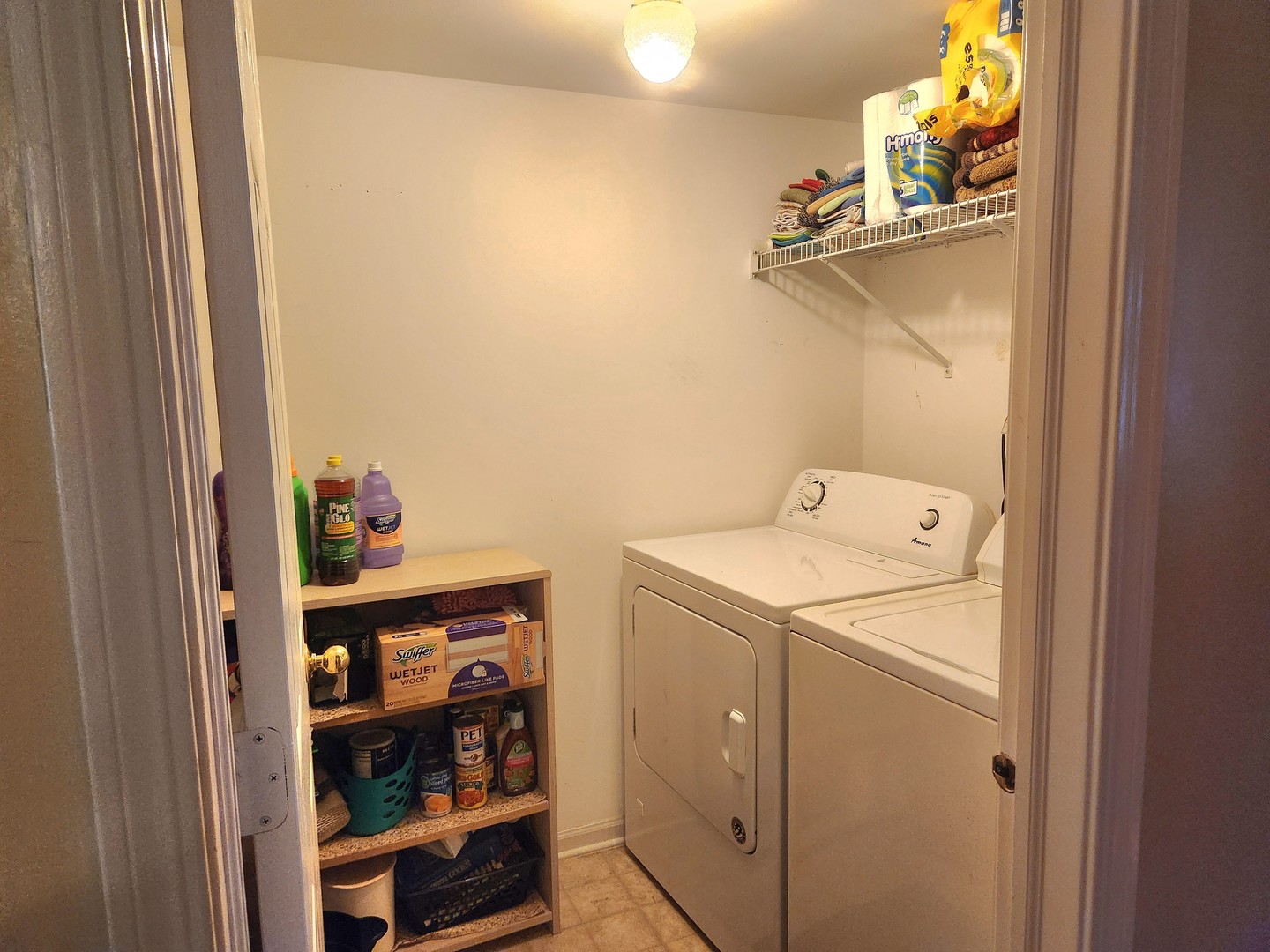 1013 Saxon Court, Unit B Elgin, IL 60120 - Photo 13 of 17 a utility room with dryer and washer