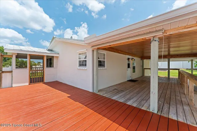 a view of swimming pool with seating space
