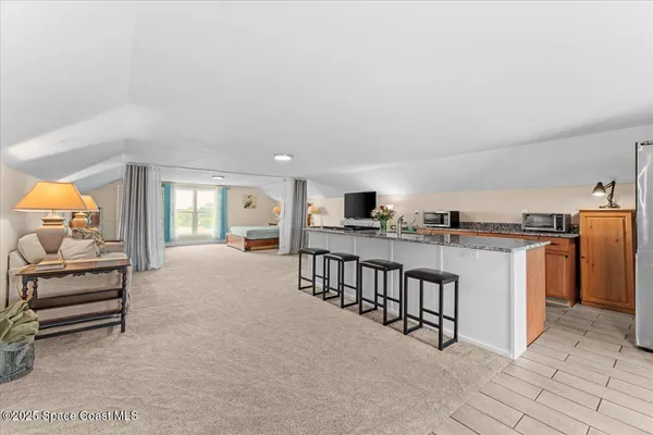 a kitchen with a stove and a sink