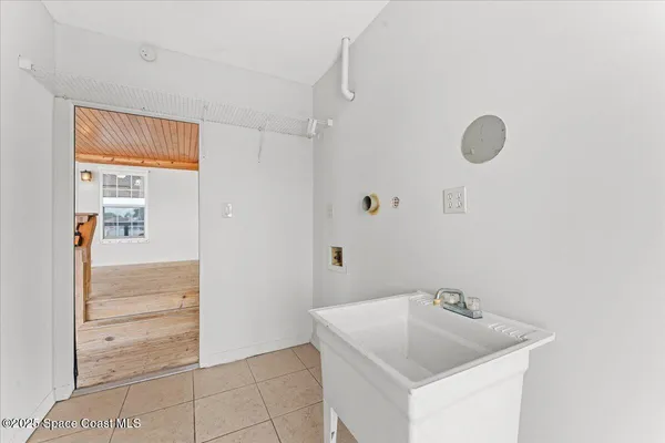 a view of a backyard with a garden and plants