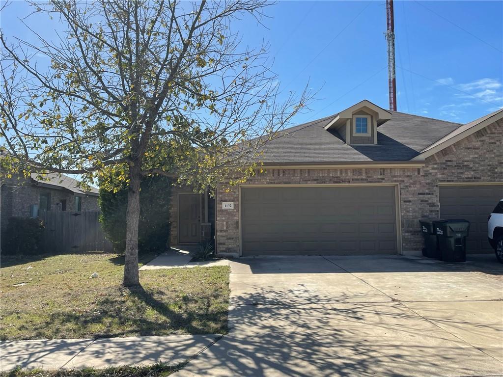 1132 Brendon Lee Lane Georgetown, TX 78626 - Photo 1 of 28 a front view of a house