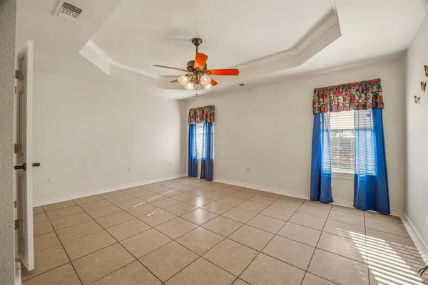a view of an empty room and window