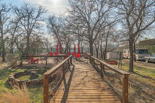 a view of a balcony with trees