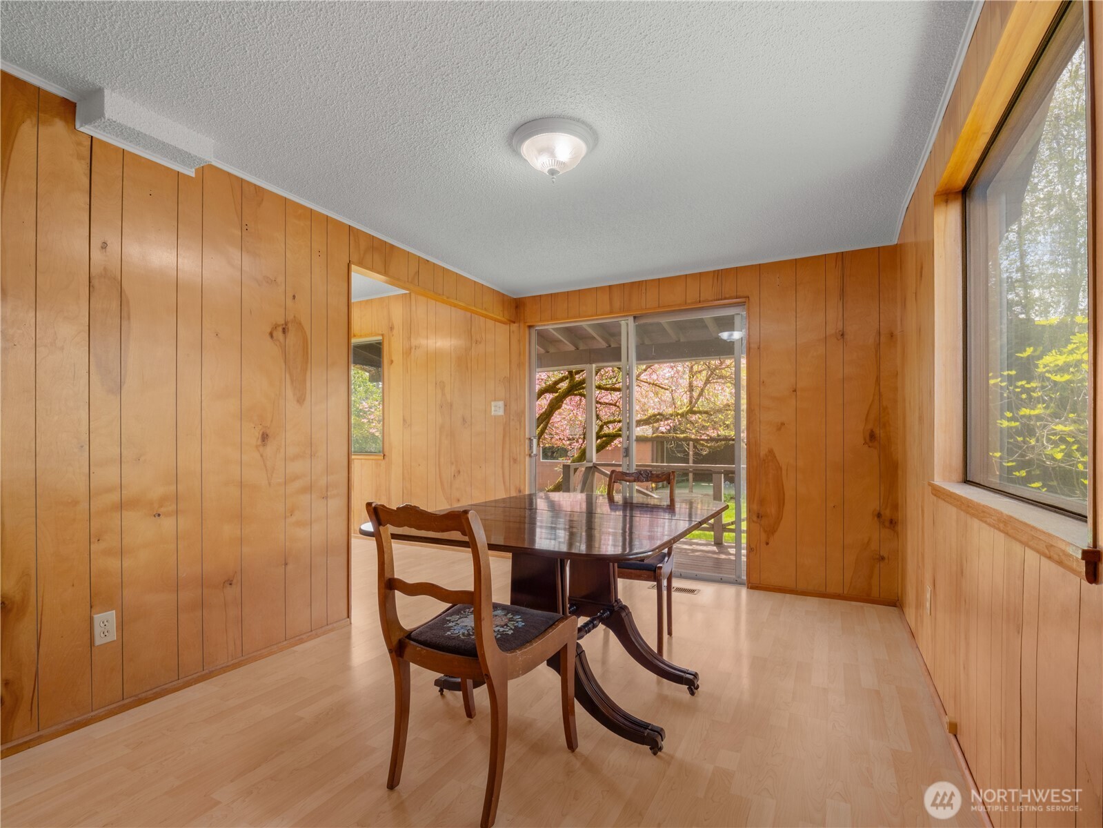 5704 North Ruby Street Tacoma, WA 98407 - Photo 14 of 38 a view of a dining room with furniture and a window