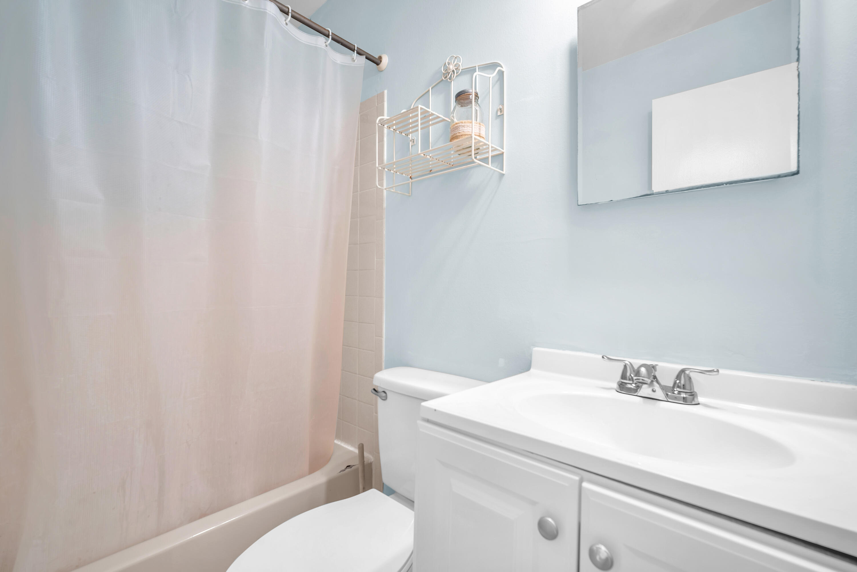 10985 Christopher Avenue Boca Raton, FL 33428 - Photo 13 of 24 a bathroom with a sink and toilet