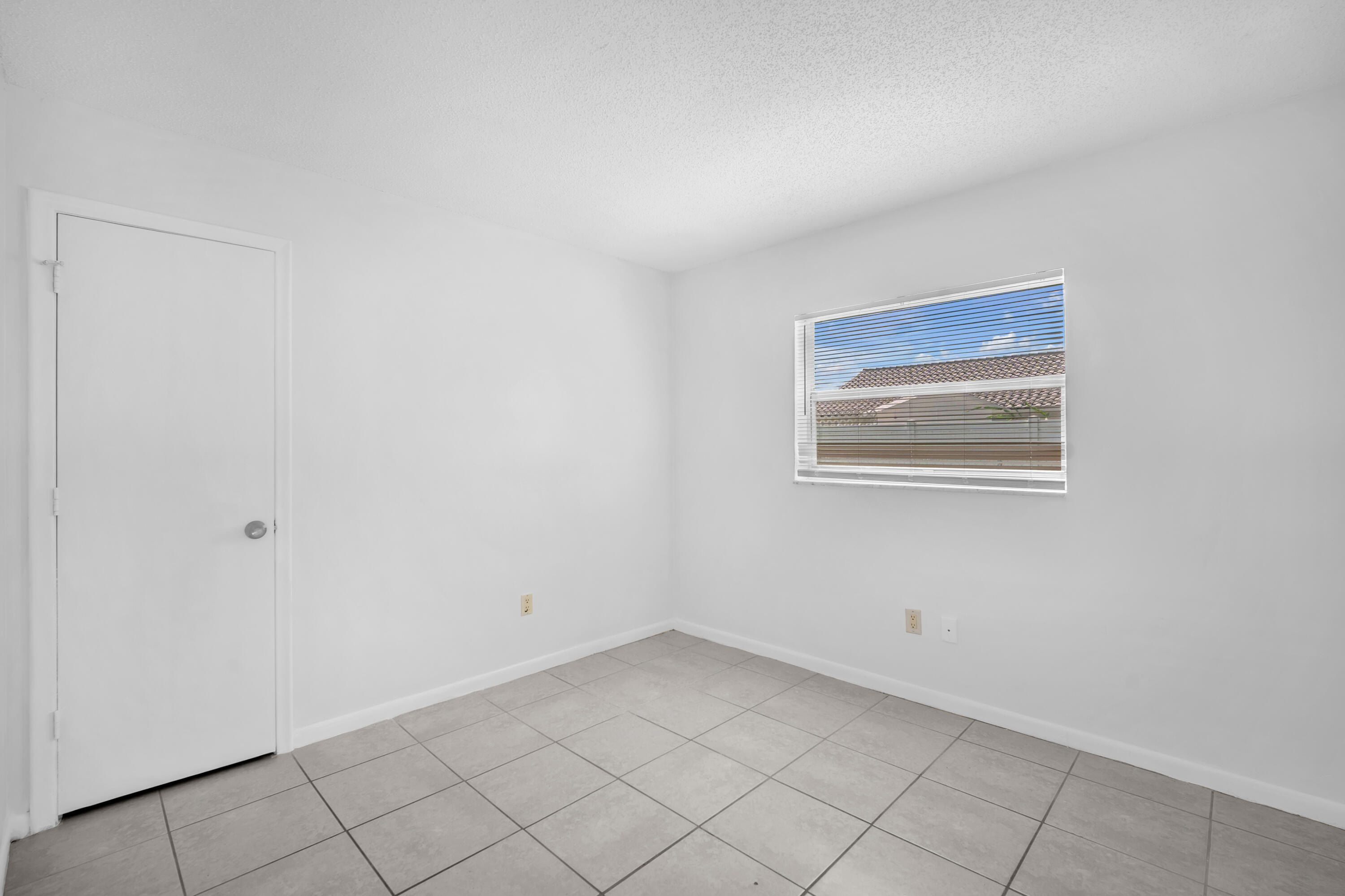 10985 Christopher Avenue Boca Raton, FL 33428 - Photo 9 of 24 a view of an empty room