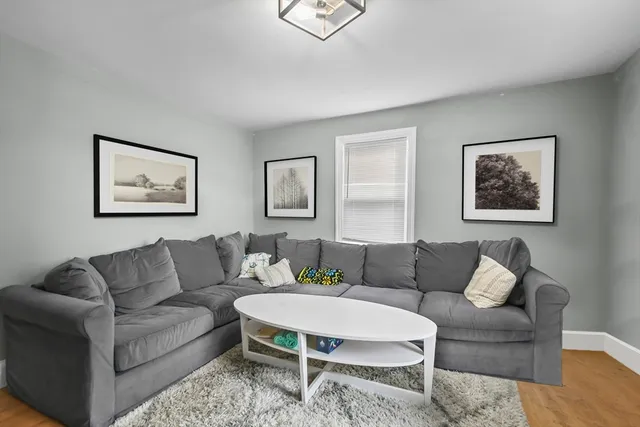 a living room with furniture and a couch
