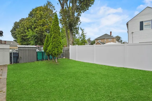 a view of a backyard with a garden