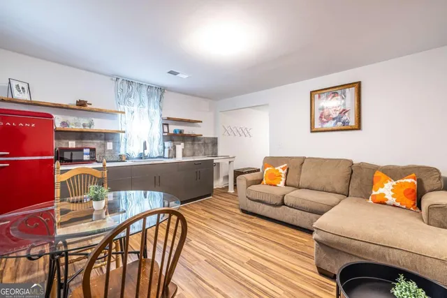 a living room with furniture and a couch