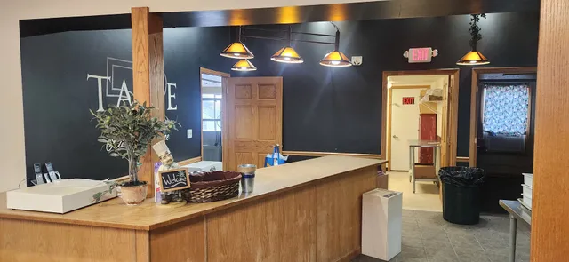 a room with furniture and a potted plant