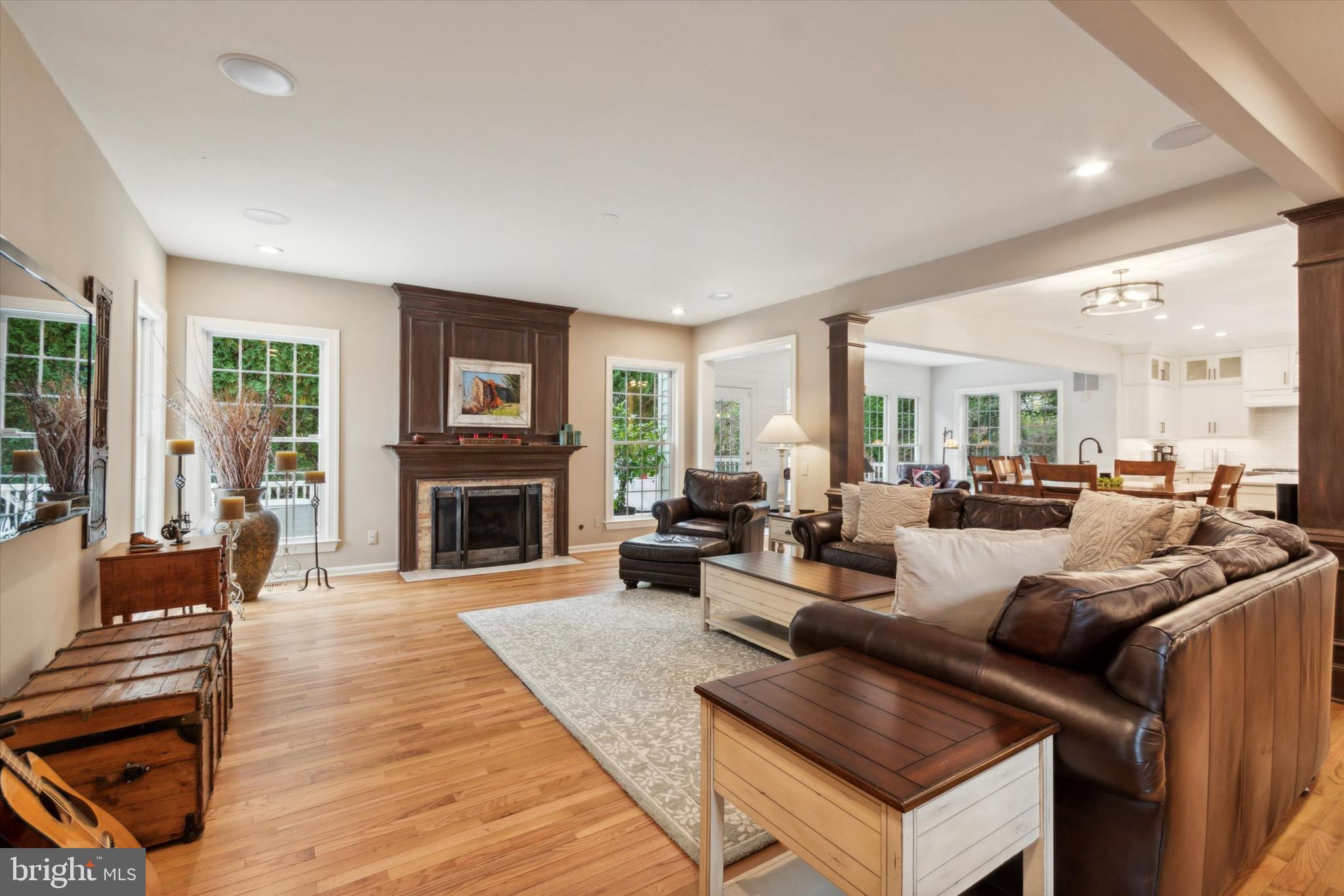 1007 Ridgehaven Road West Chester, PA 19382 - Photo 13 of 36 a living room with furniture fireplace and a large window