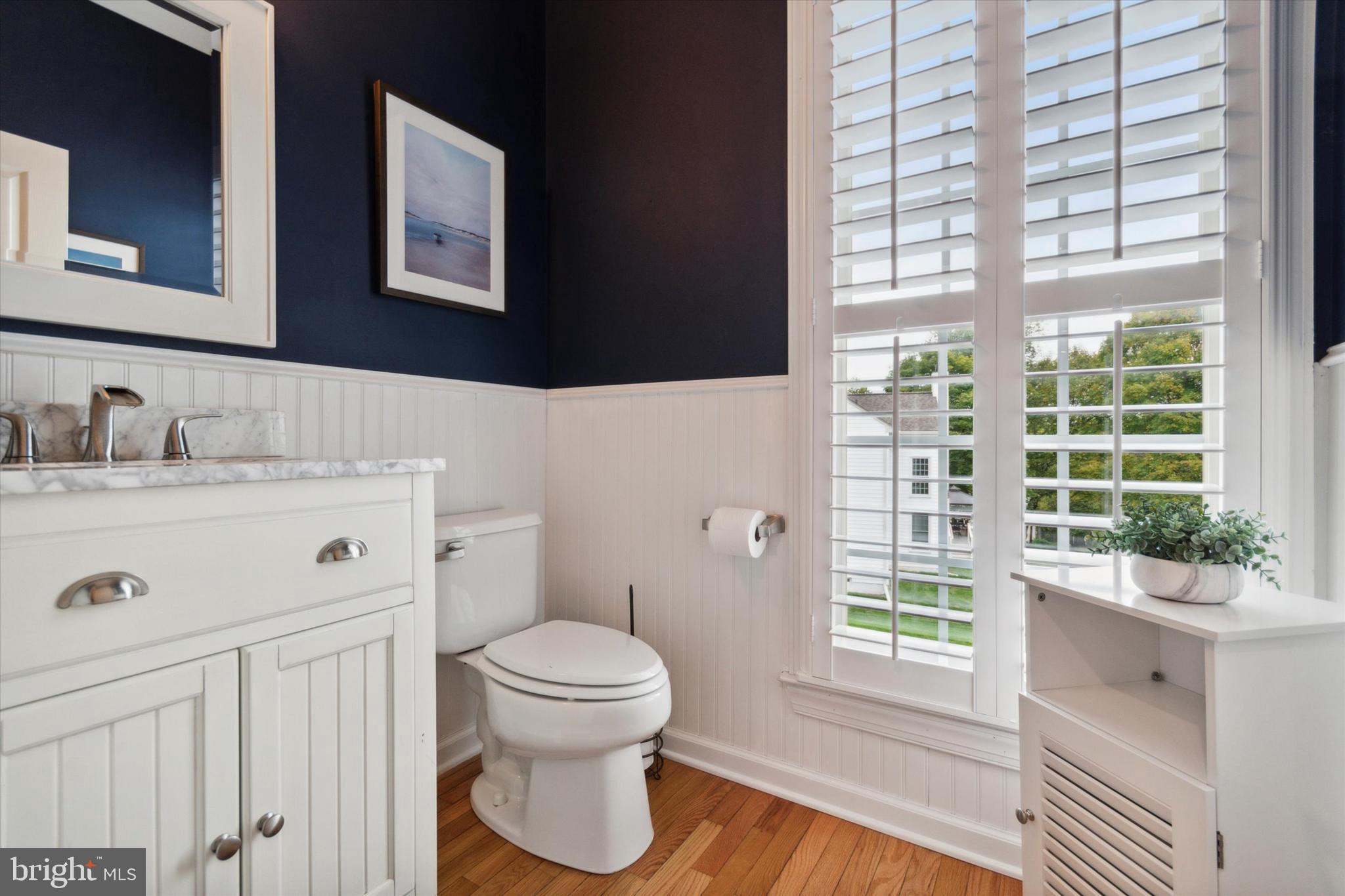 1007 Ridgehaven Road West Chester, PA 19382 - Photo 16 of 36 a bathroom with a sink toilet and window