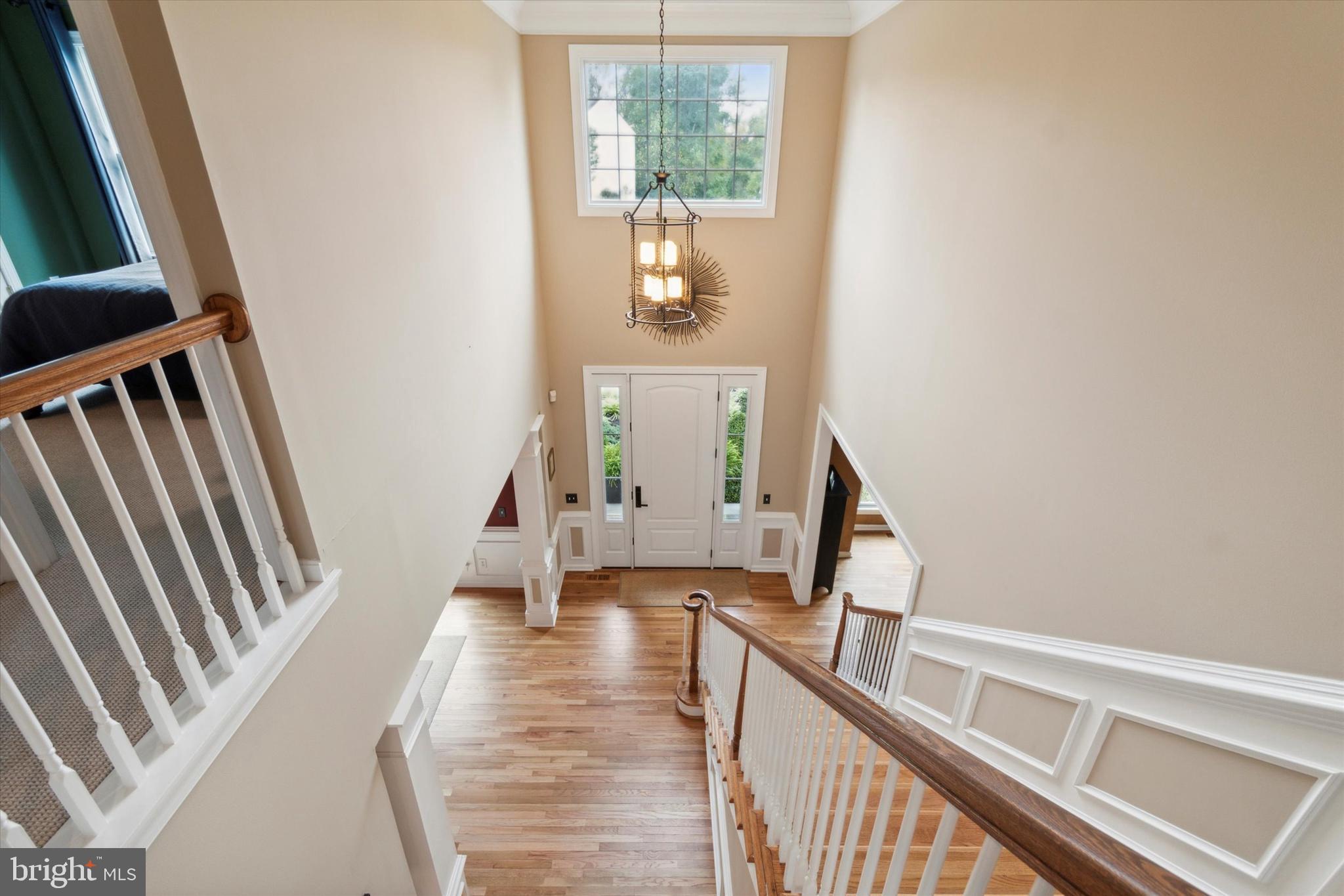 1007 Ridgehaven Road West Chester, PA 19382 - Photo 17 of 36 a view of a hallway view with wooden floor and staircase