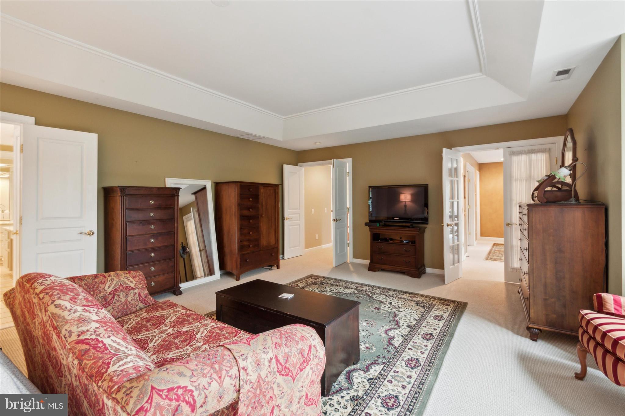 1007 Ridgehaven Road West Chester, PA 19382 - Photo 20 of 36 a bedroom with a large bed and a television