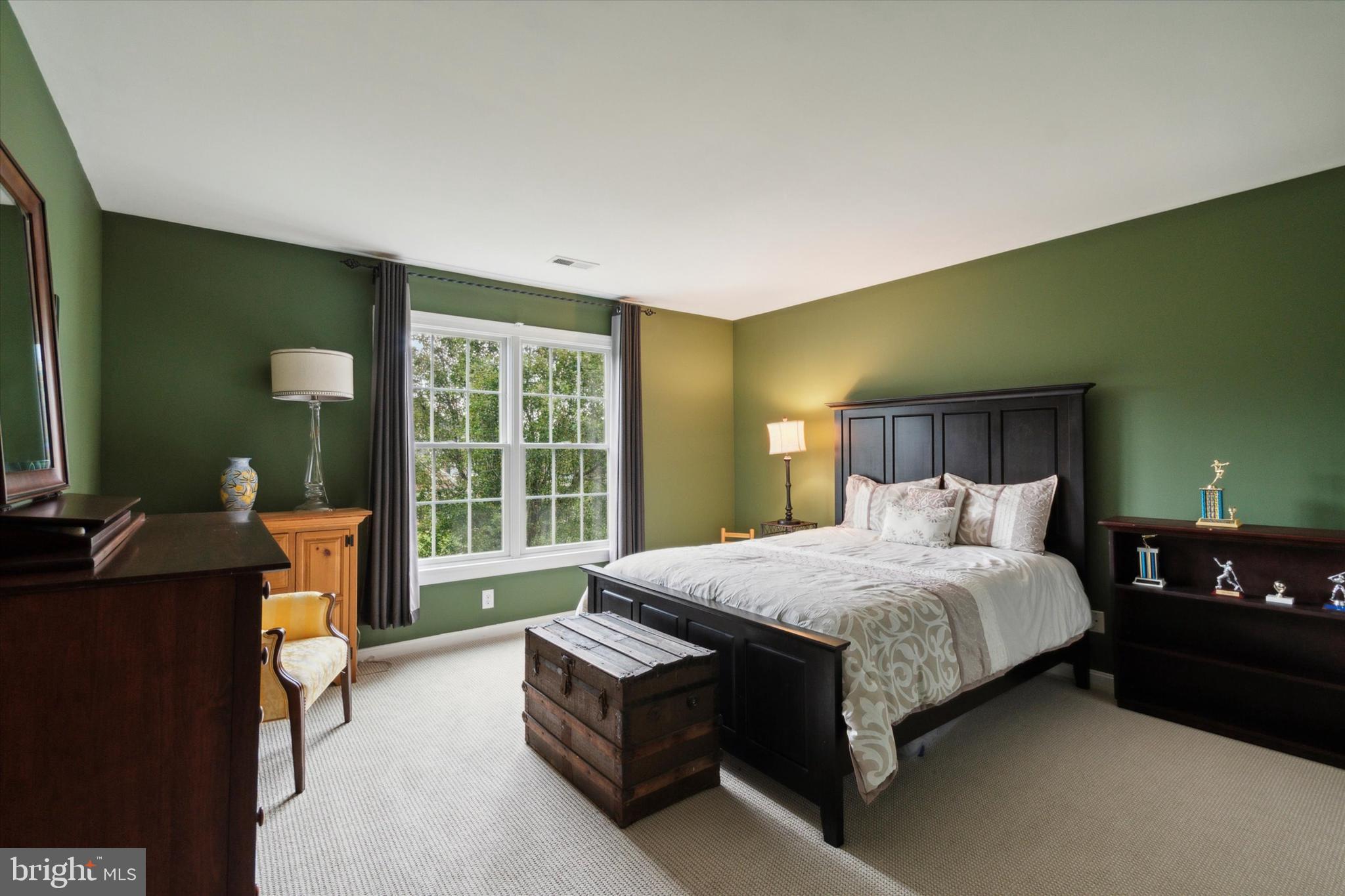 1007 Ridgehaven Road West Chester, PA 19382 - Photo 28 of 36 a bedroom with a bed and a dresser next to a window