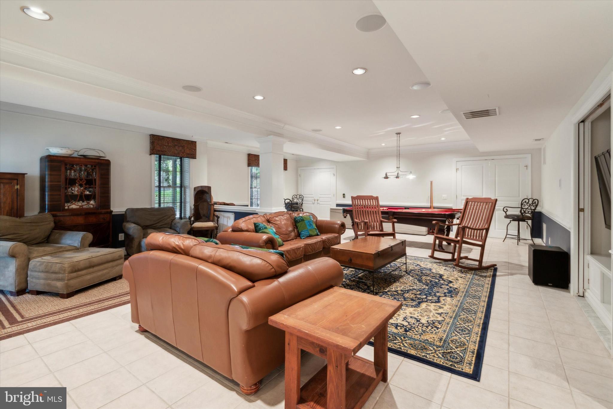 1007 Ridgehaven Road West Chester, PA 19382 - Photo 30 of 36 a living room with furniture and a flat screen tv