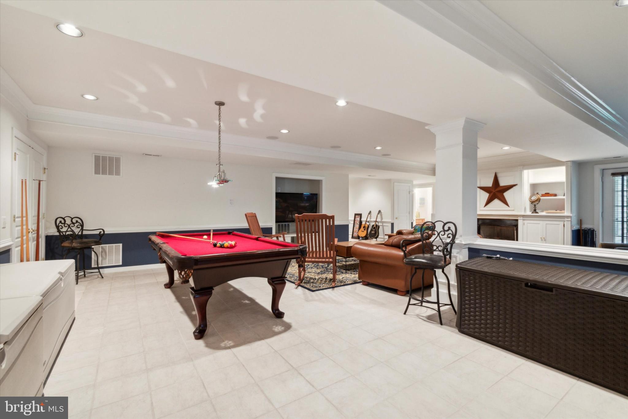 1007 Ridgehaven Road West Chester, PA 19382 - Photo 31 of 36 a living room with furniture a rug and white walls