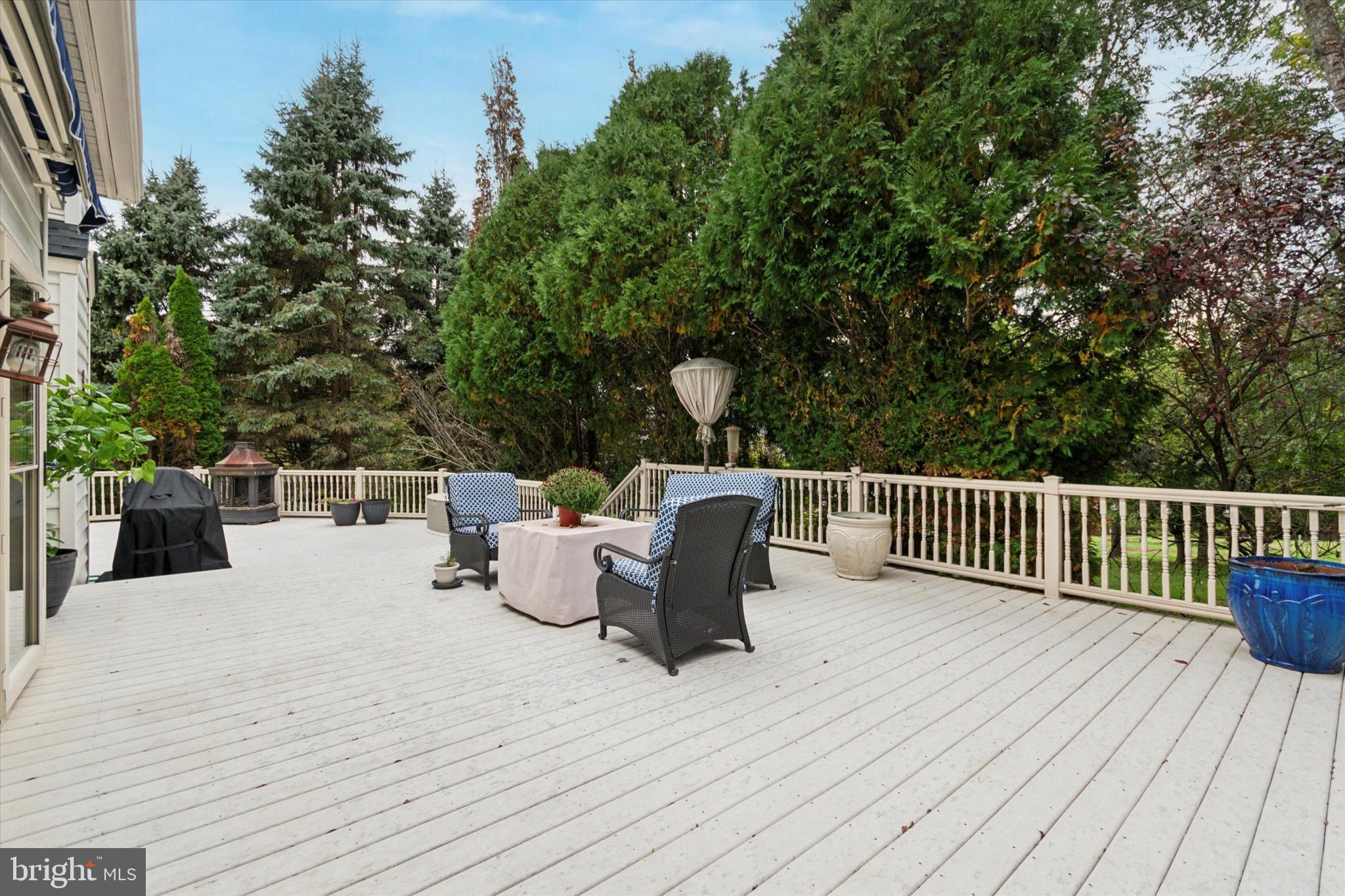 1007 Ridgehaven Road West Chester, PA 19382 - Photo 35 of 36 a view of a deck with furniture and wooden floor