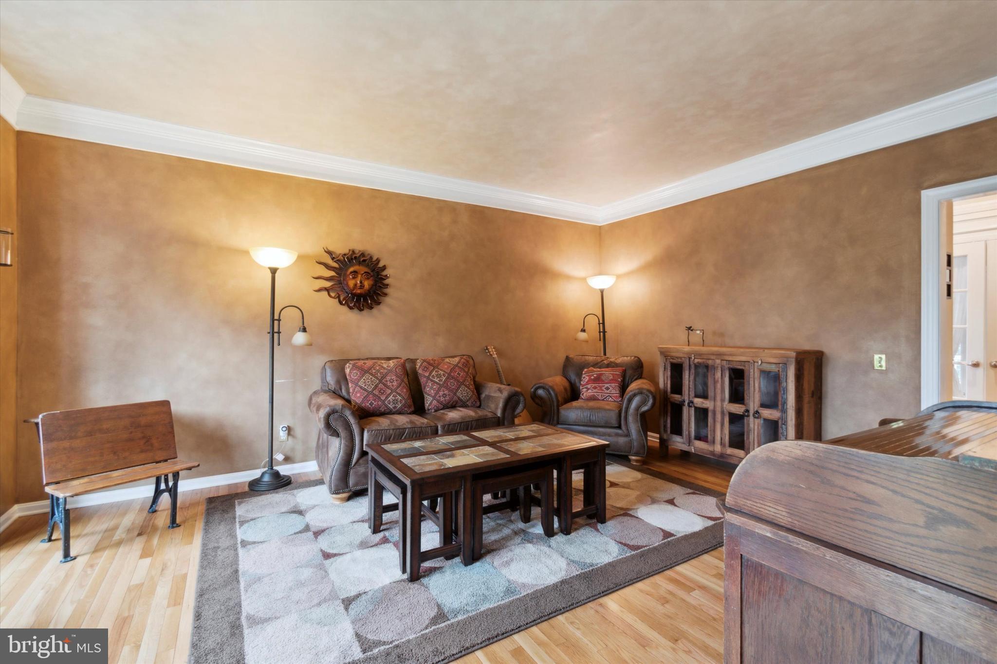 1007 Ridgehaven Road West Chester, PA 19382 - Photo 4 of 36 a living room with furniture and a rug